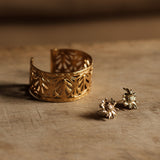 petites boucles d'oreilles fleurs dorée créateur