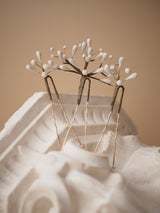 pics à cheveux de mariée en porcelaine